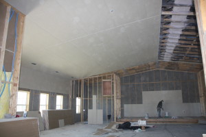 What a difference a day makes...the drywall is going up! 1 of 4 - April 13th