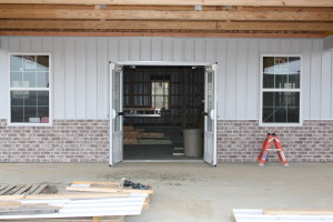 Dec 20th - wanscoting & siding getting done on South side